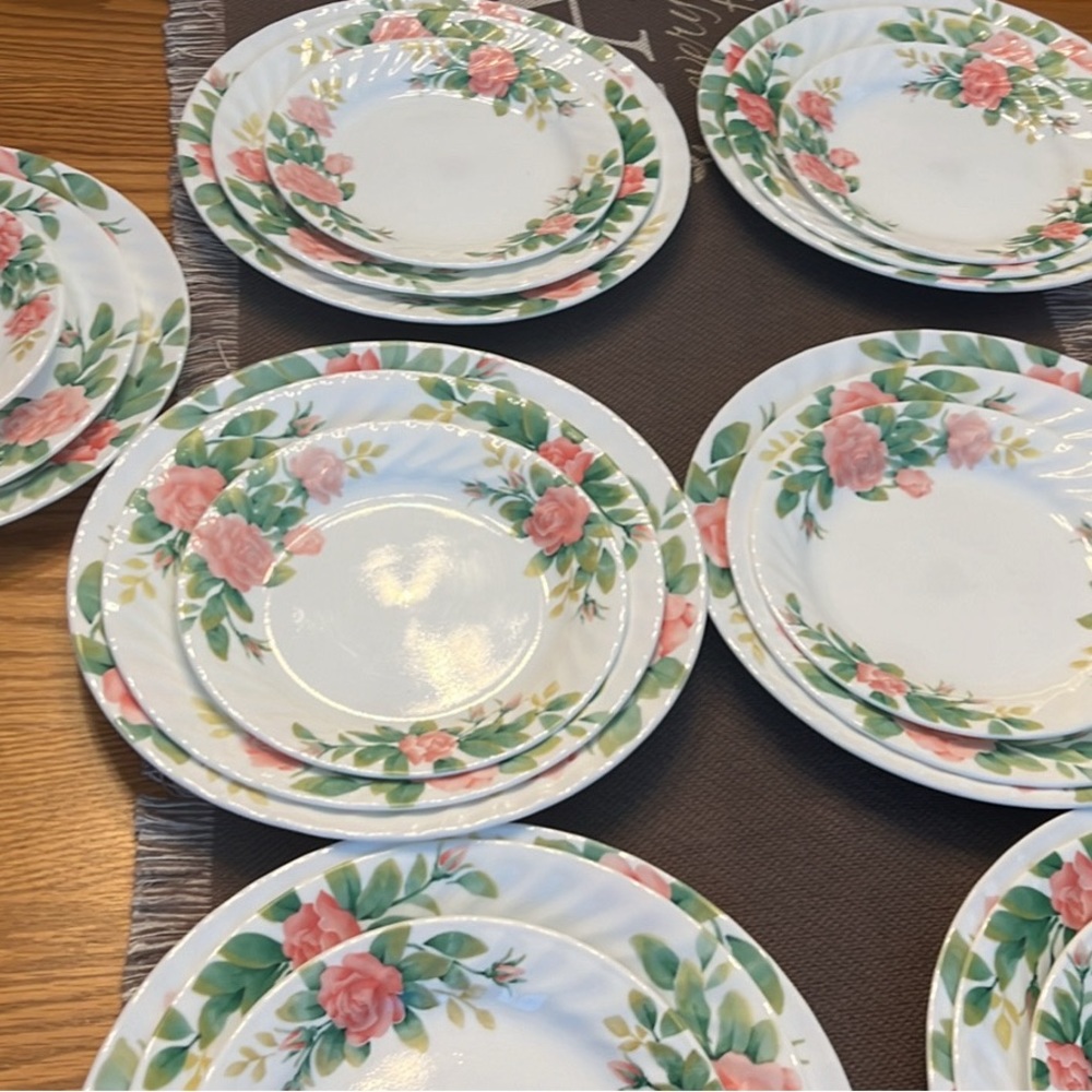 Corelle Elegant Rose service for 8 -3 plates in one setting.
